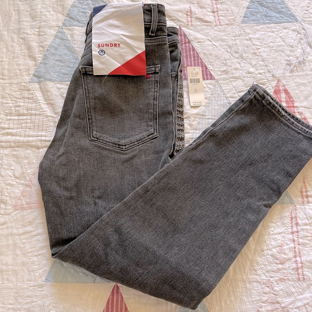 Anthropologie Sundry leopard trim ultra high rise stone wash jeans